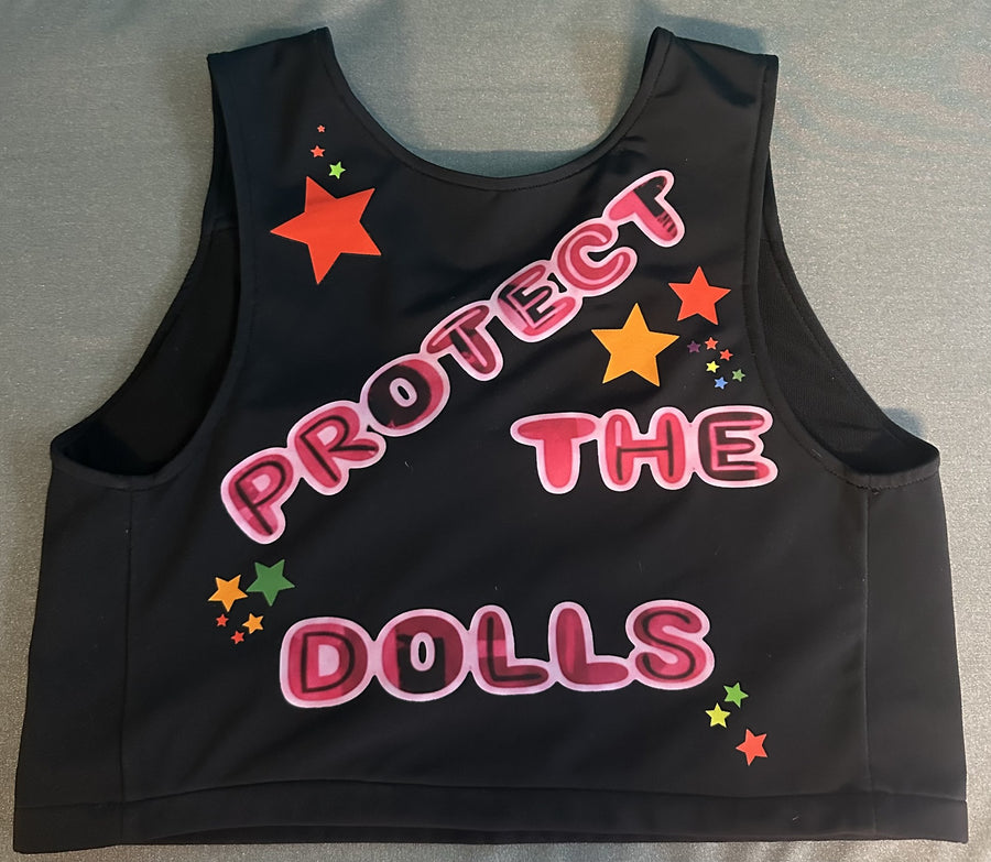 Front of the black Lola Olivia pride tank that reads Protect the Dolls